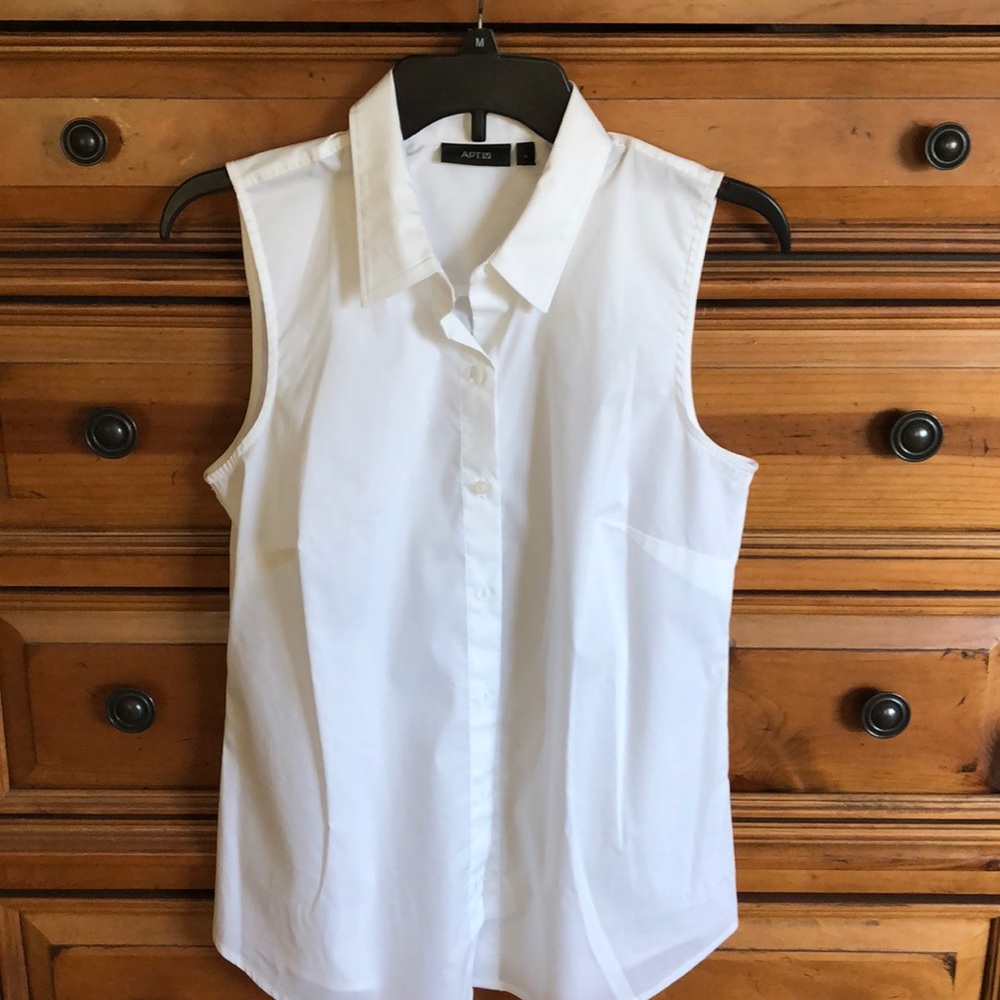 Basic white sleeveless button-down